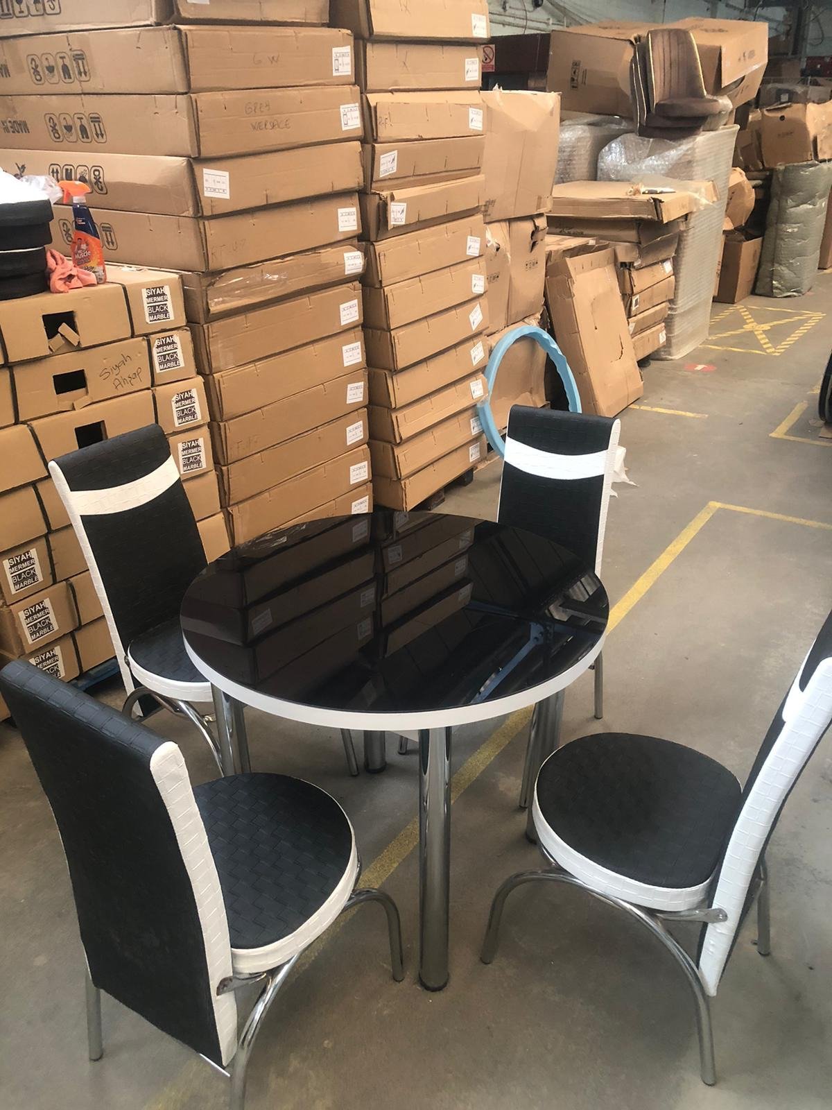 round black&white table +4 cream chairs. silver leg