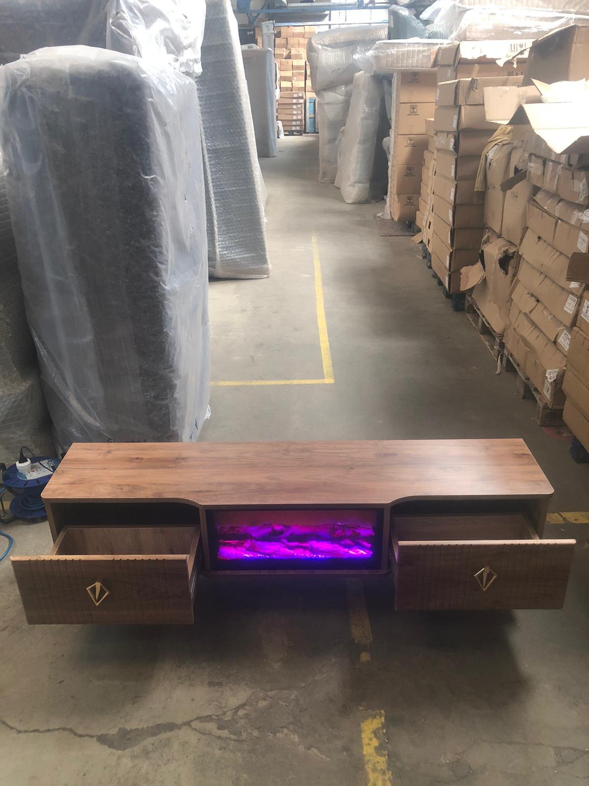 modern living room tv unit with fireplace