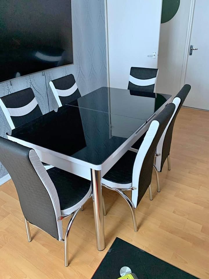 brand new luxury black glass dining table with 6 chairs