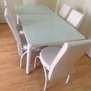 contemporary minimalist white dining suite with ergonomic high back chairs