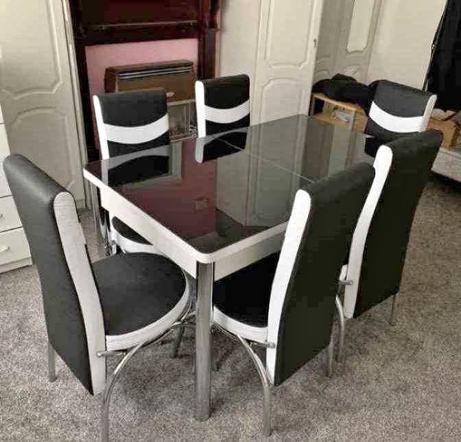 modern high gloss grey dining set with chrome legs & high back padded chairs
